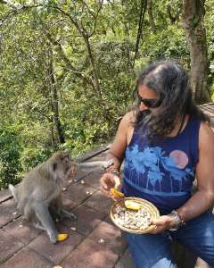 Mohanji feeding a monkey - Interview with Mohanji